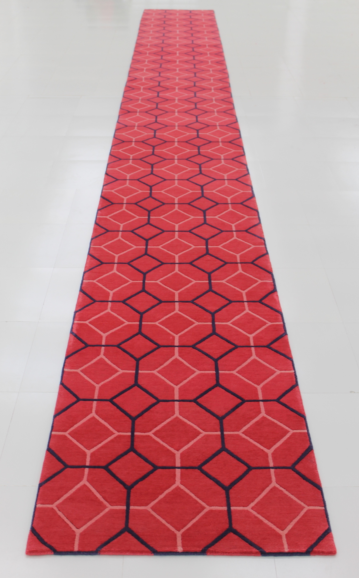 Red hallway runner shape rug